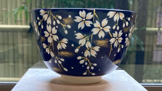 Matcha tea bowl, lapis lazuli glaze, cherry blossom